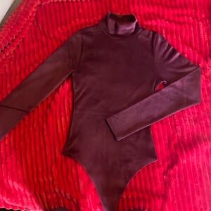 American Eagle Velvet body suit, never worn NWT. Extremely soft and stretchy